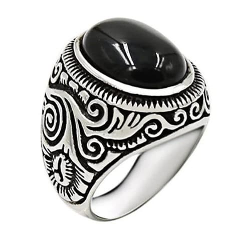 Cette bague en pierre noire avec un design complexe est un véritable bijou pour les hommes. Fabriquée en acier inoxydable de haute qualité, elle est à la fois élégante et durable. La pierre howlite noire ajoute une touche de mystère et de sophistication à cette bague. Son design détaillé et intriqué est un véritable chef-d'œuvre, mettant en valeur l'artisanat exceptionnel qui a été investi dans sa création. Que ce soit pour une occasion spéciale ou pour ajouter une touche de style à votre tenue quotidienne, cette bague en pierre noire est un choix parfait. La pierre Howlite est un minéral naturel qui présente de nombreux bienfaits pour le corps et l'esprit. Cette pierre est connue pour ses propriétés apaisantes et calmantes, ce qui en fait un excellent choix pour ceux qui cherchent à réduire le stress et l'anxiété. Elle favorise également un sommeil réparateur et aide à soulager les troubles du sommeil tels que l'insomnie. De plus, la pierre Howlite est réputée pour favoriser la concentration et l'apprentissage, ce qui en fait un allié précieux pour les étudiants et les personnes qui ont besoin de rester concentrées dans leur travail. Enfin, cette pierre est également utilisée en lithothérapie pour ses propriétés purifiantes et énergisantes, aidant ainsi à éliminer les énergies négatives et à équilibrer les chakras.